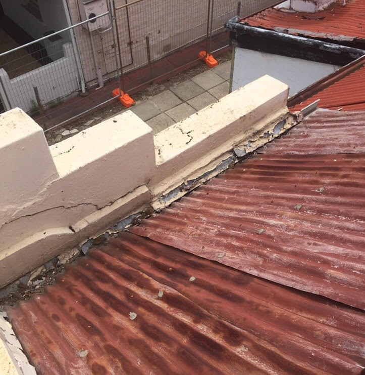 Before - 30 Year Old Roof With Rusted Gutter, Broken Brick Work